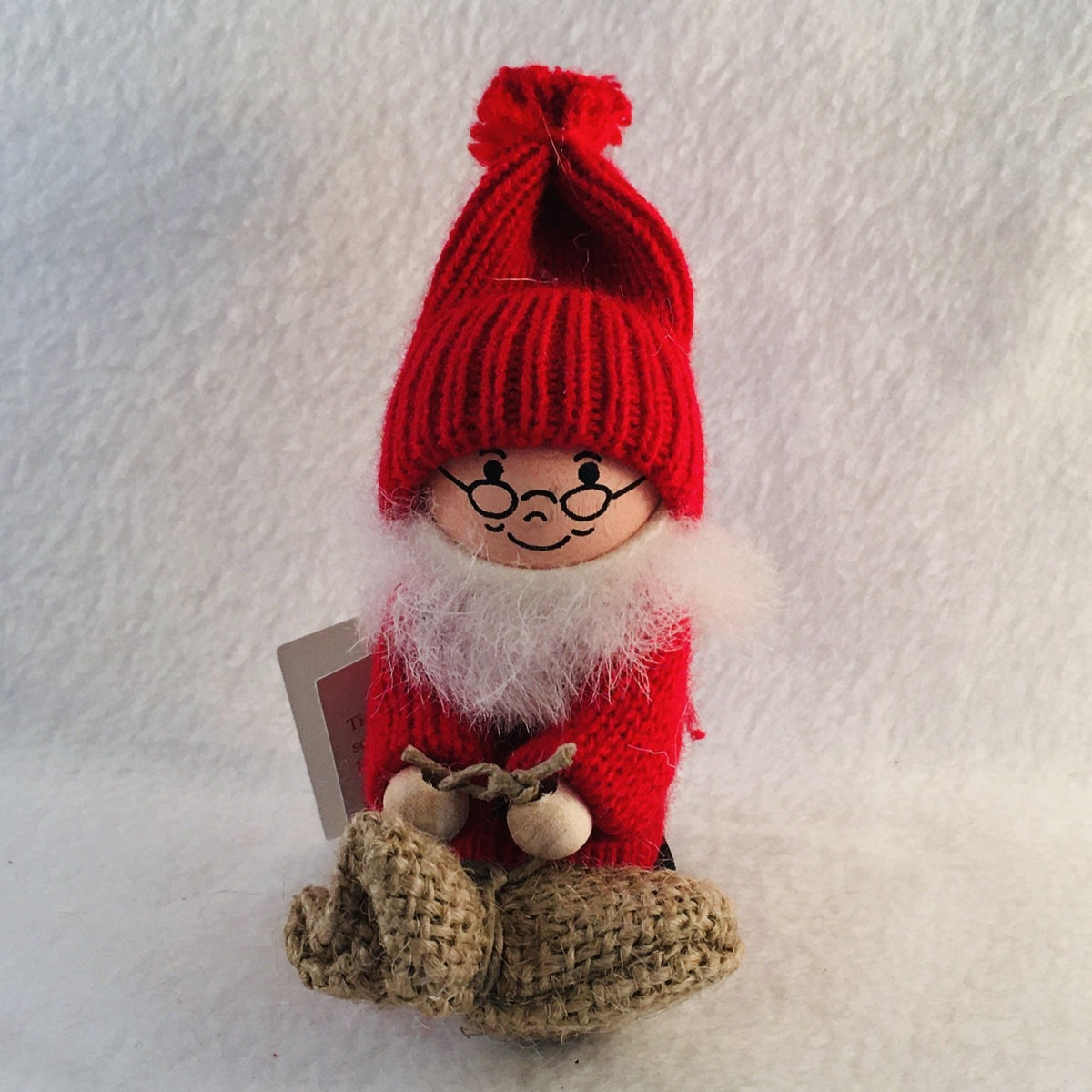 Swedish tomte holding a burlap sack – Gift Chalet