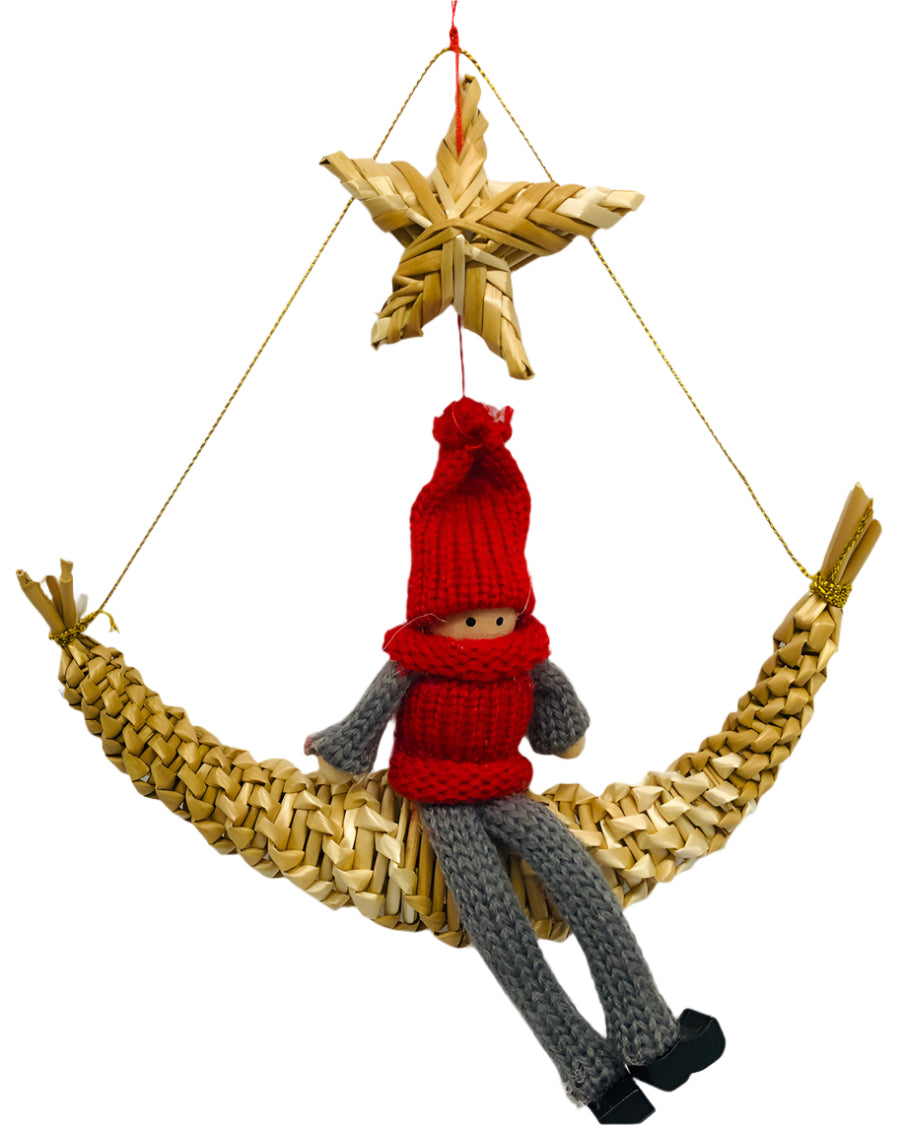 Gnome sitting on half moon with star