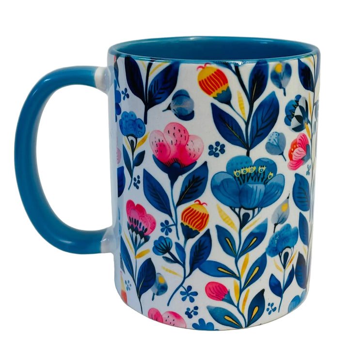 Flowers coffee mug with blue handle
