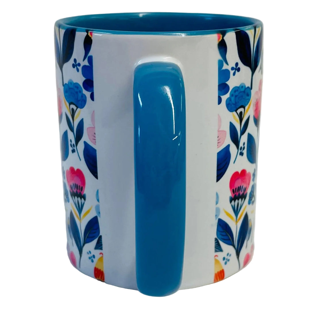 Flowers coffee mug with blue handle