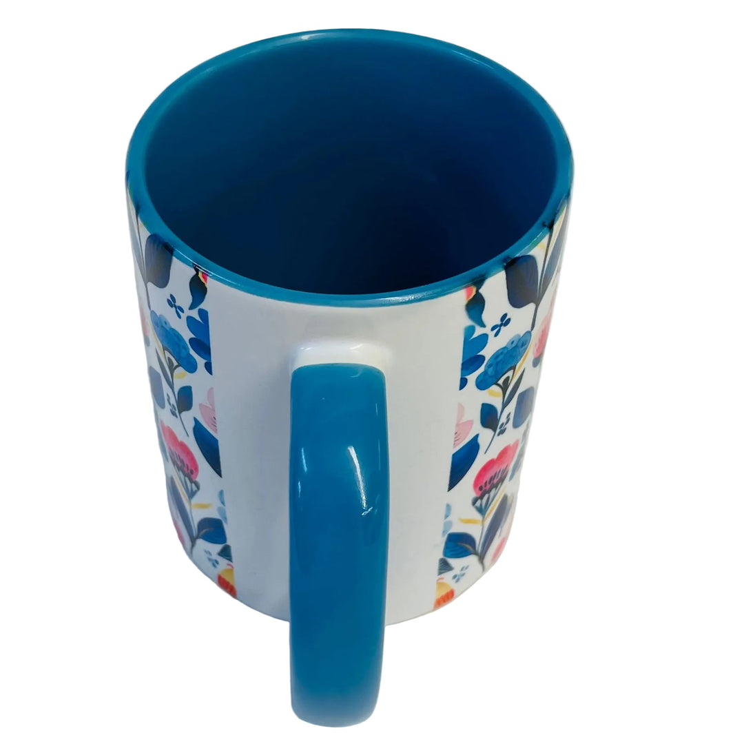 Flowers coffee mug with blue handle