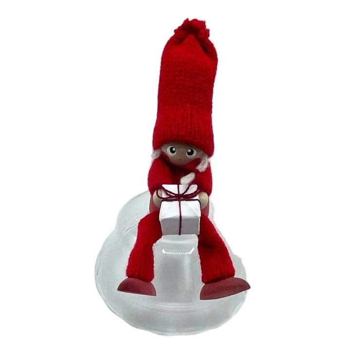 Hand made Tomte Gnome girl sitting with gift