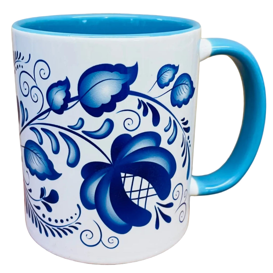 Blue Folk art flowers coffee mug with blue handle
