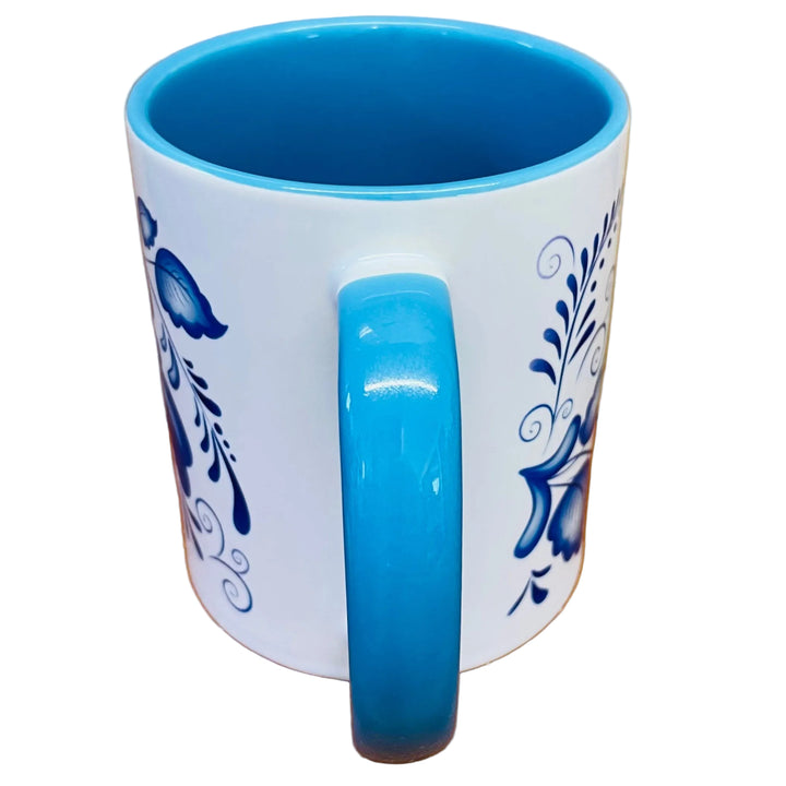 Blue Folk art flowers coffee mug with blue handle