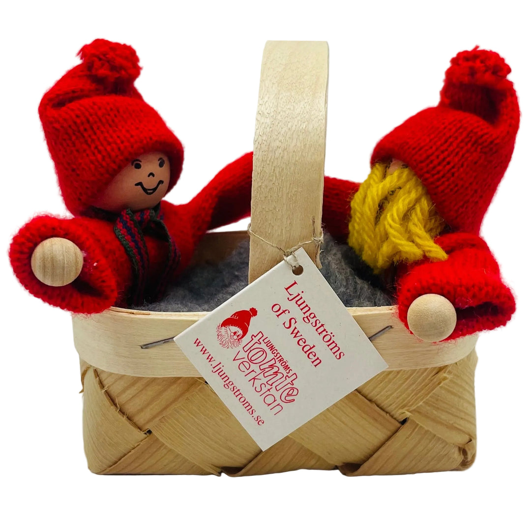 Swedish tomte children in basket