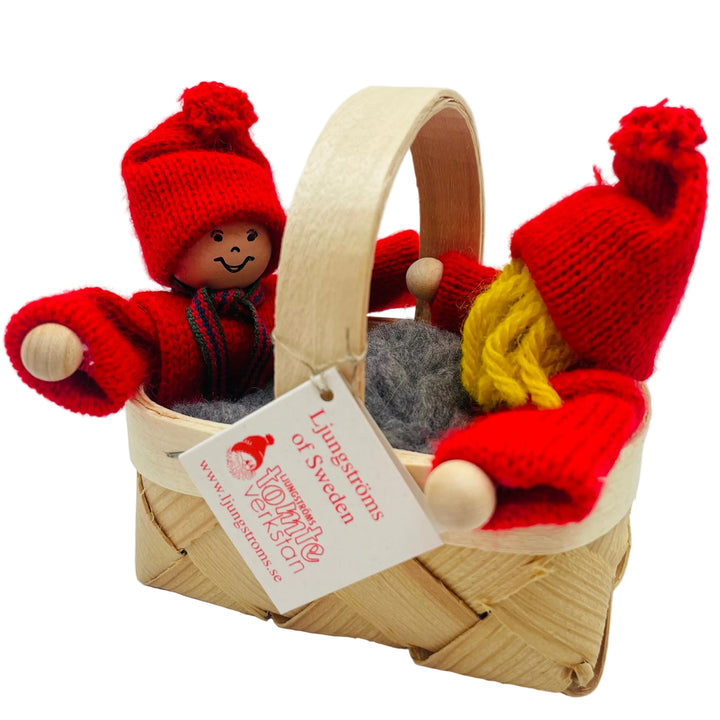 Swedish tomte children in basket