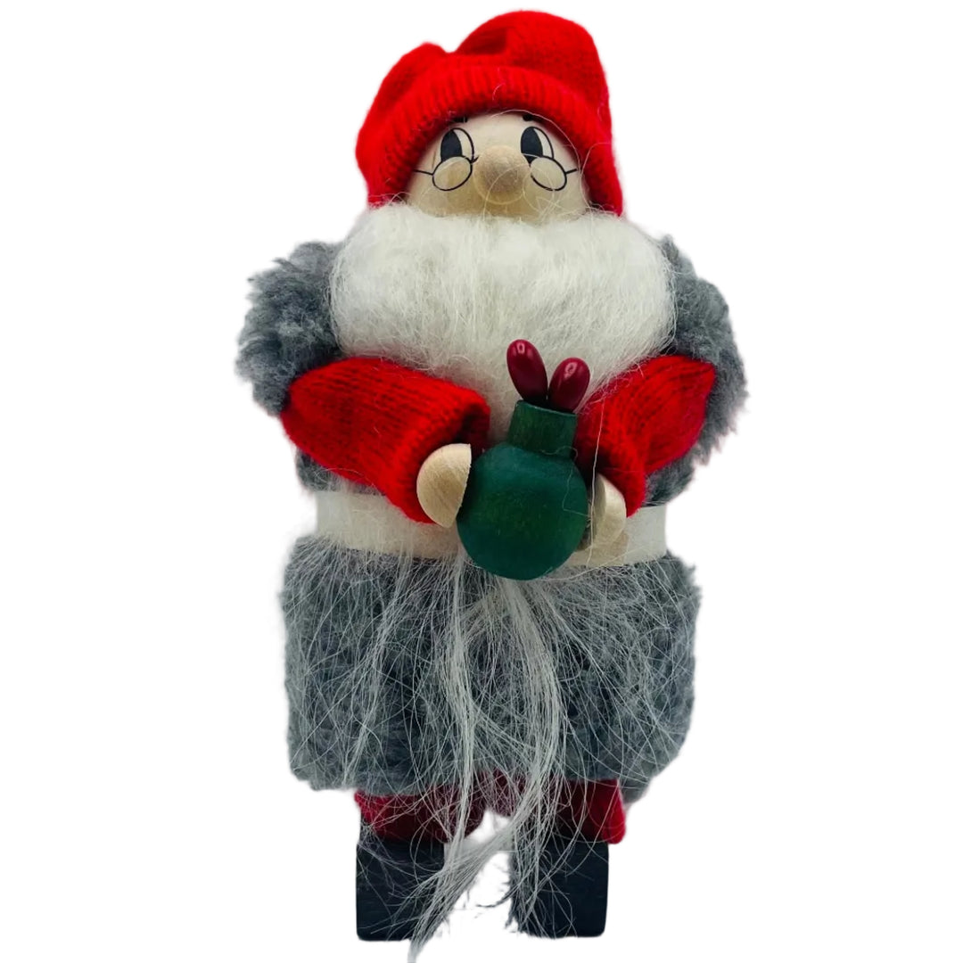Swedish tomte with flower vase
