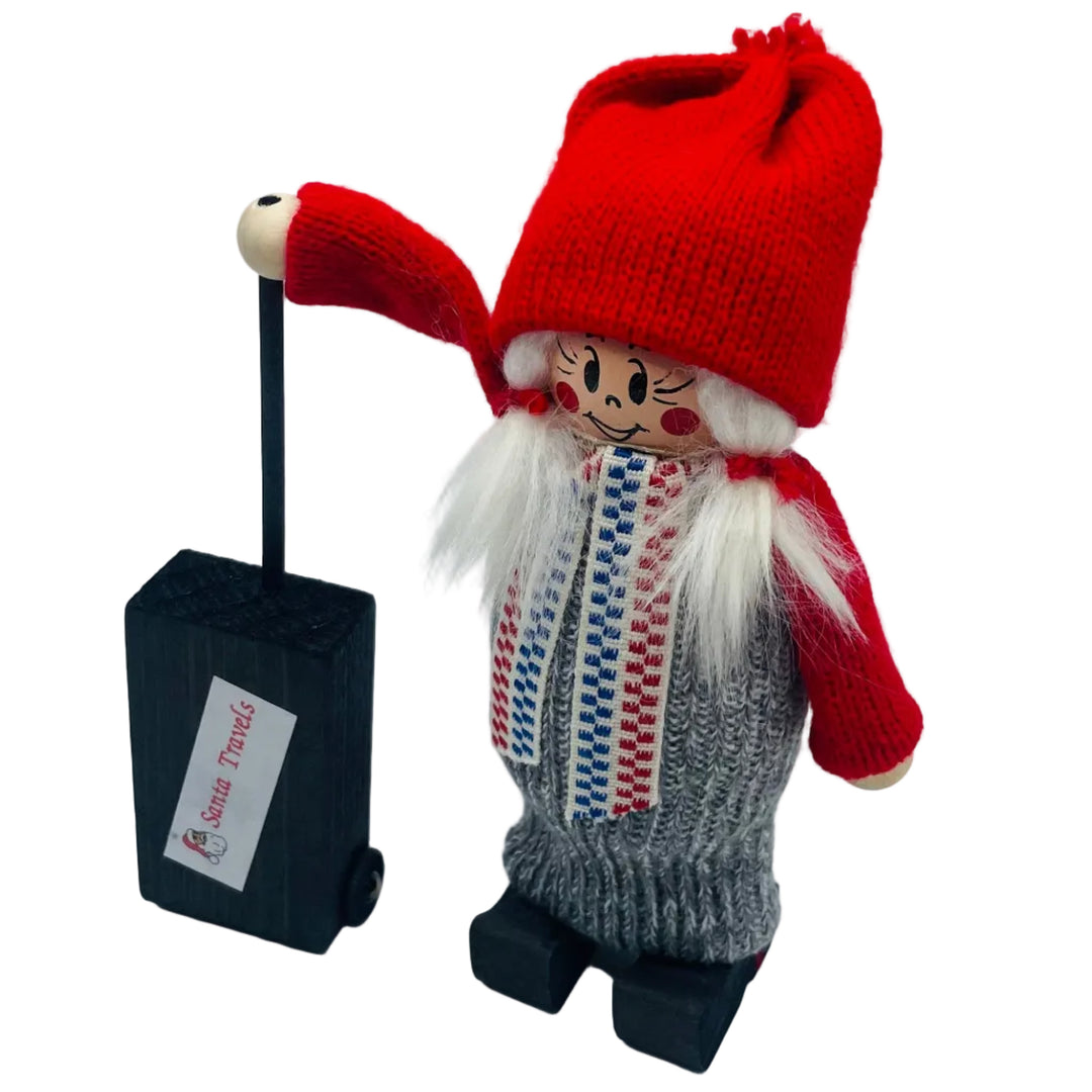 Swedish tomte lady with suitcase