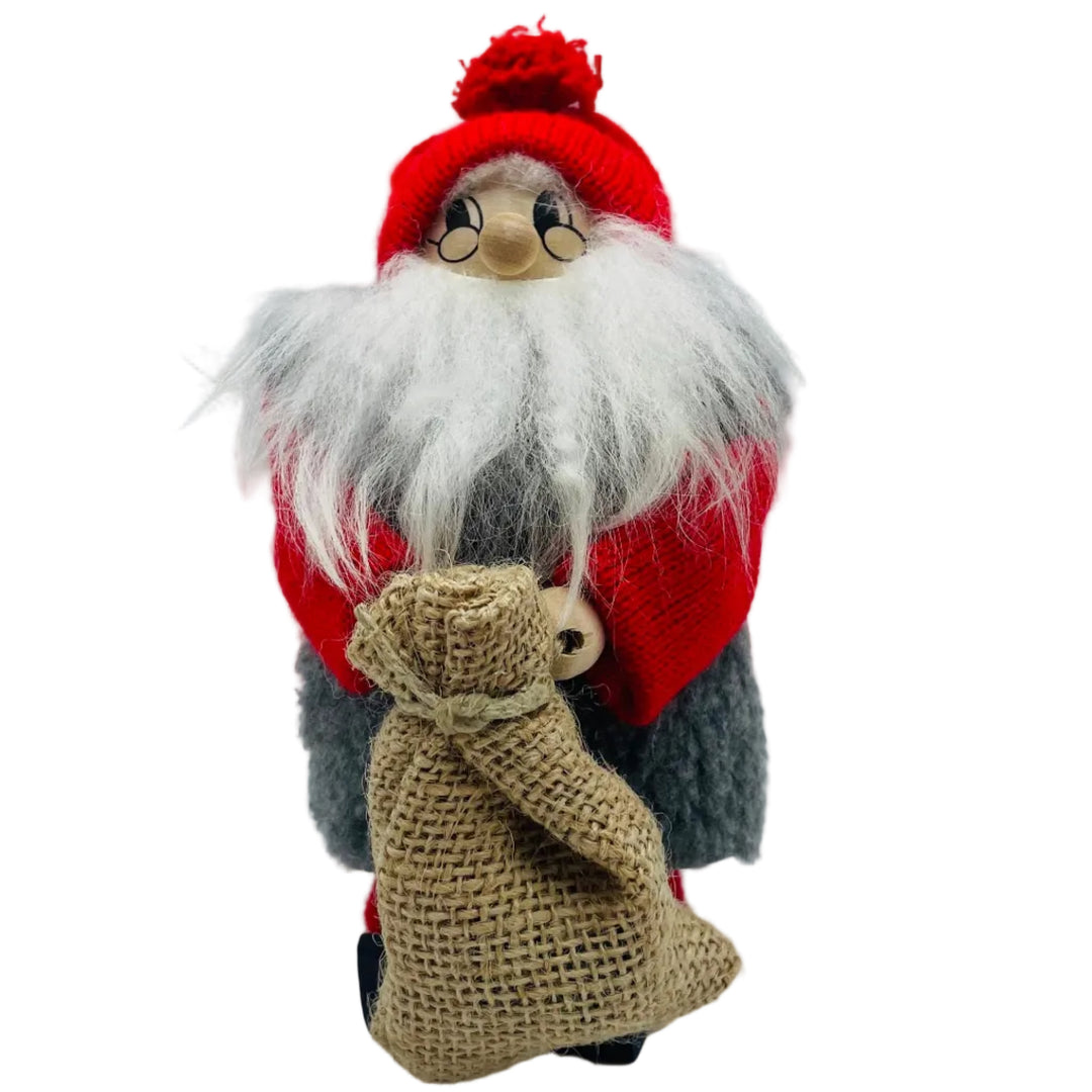 Swedish tomte holding a burlap sack