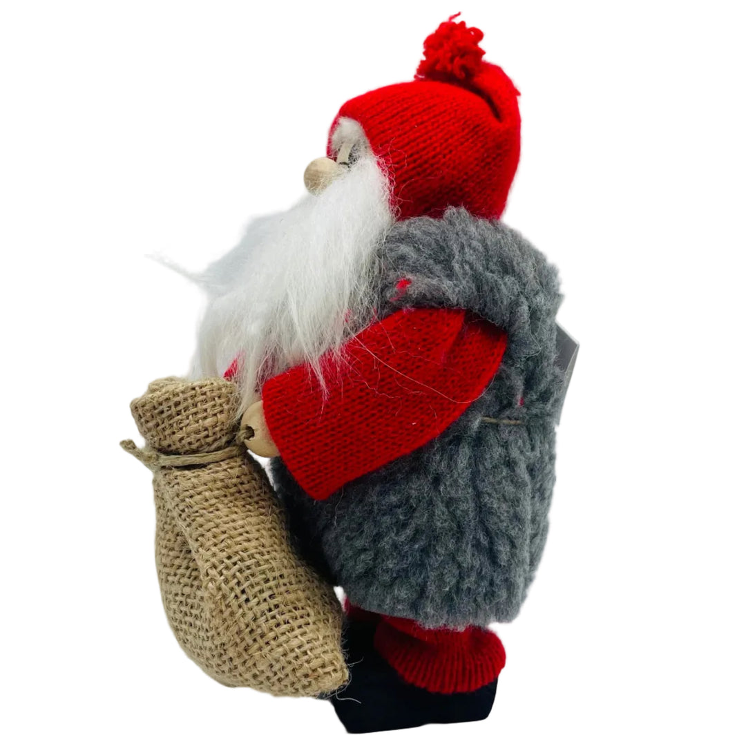 Swedish tomte holding a burlap sack