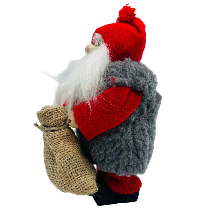 Swedish tomte holding a burlap sack