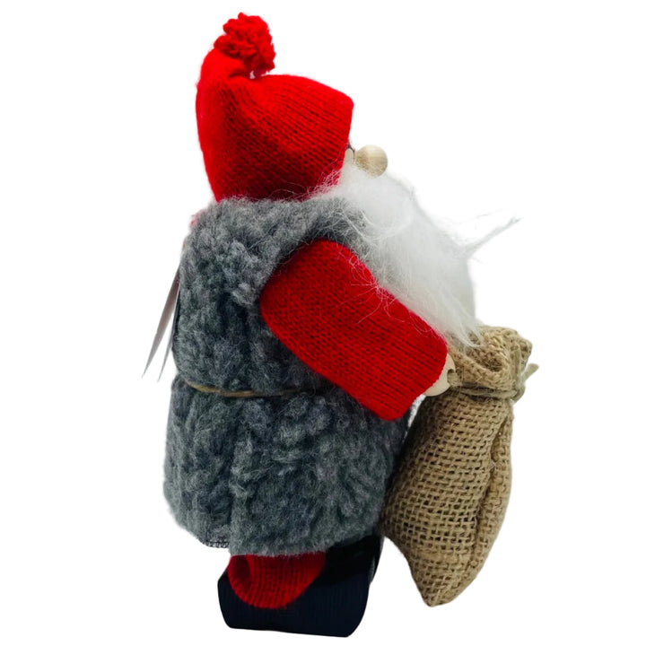 Swedish tomte holding a burlap sack