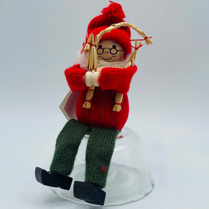Swedish tomte  holding straw goat
