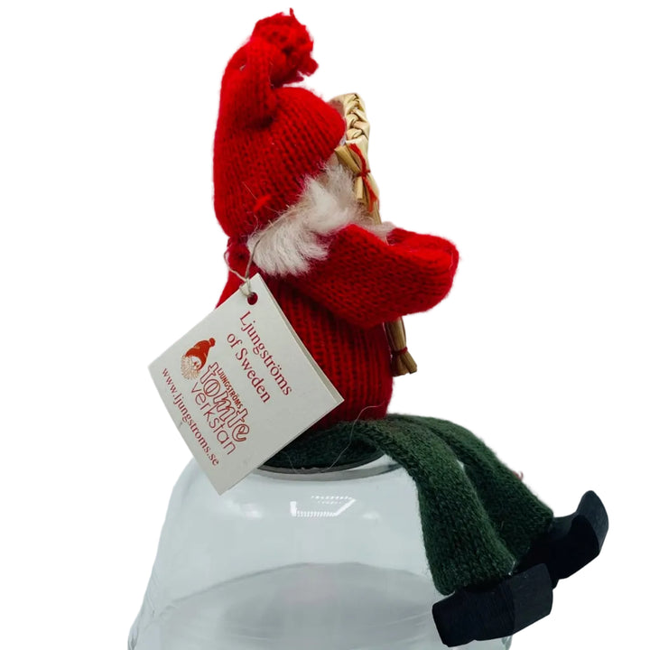 Swedish tomte  holding straw goat