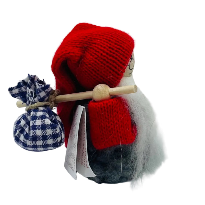 Swedish tomte vagabond tramp with bindle bag on stick