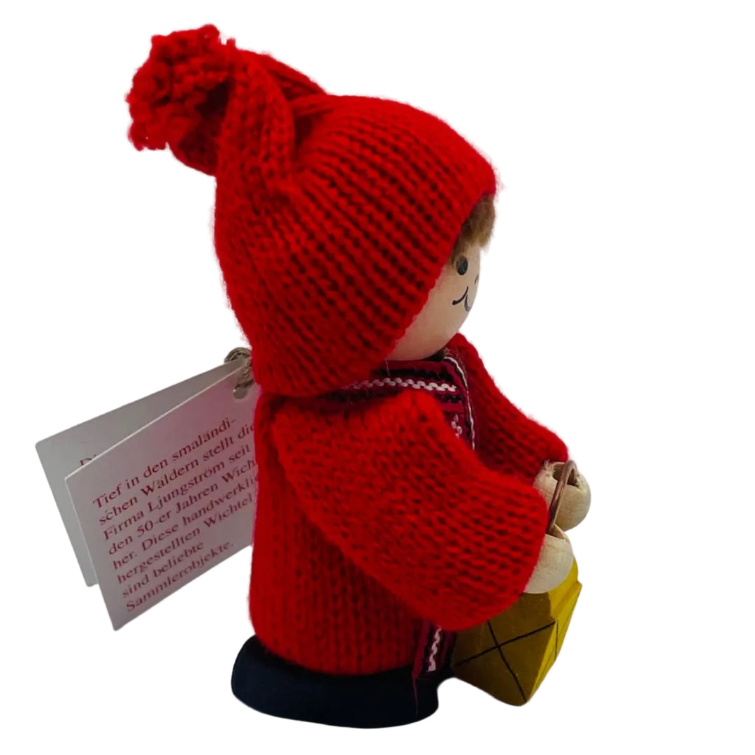 Swedish tomte boy with lantern