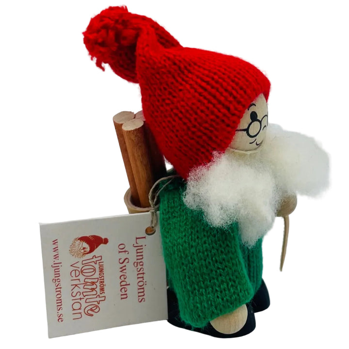 Swedish tomte with firewood