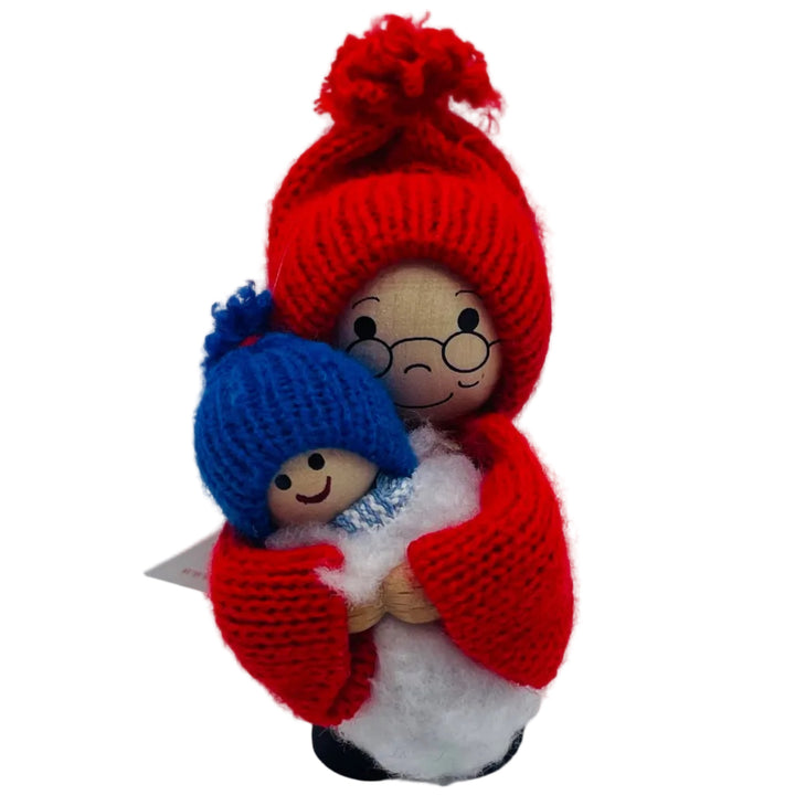 Swedish tomte holding baby