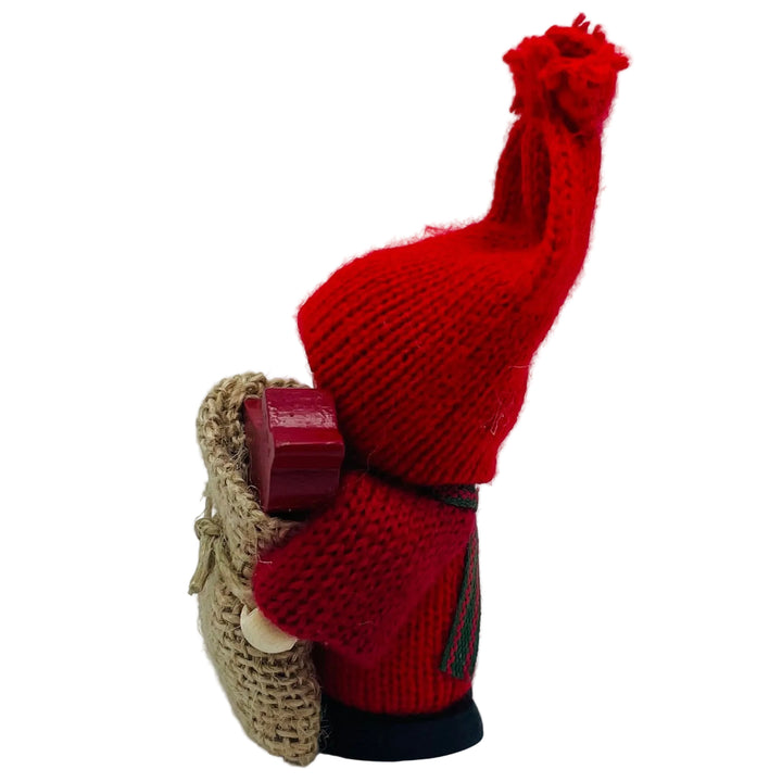 Swedish tomte with Dala horse in burlap sack