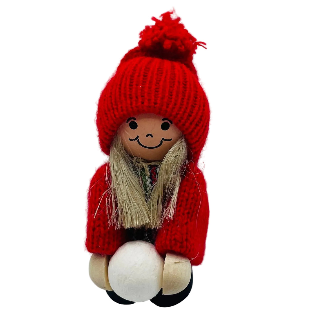 Swedish tomte girl with snowball