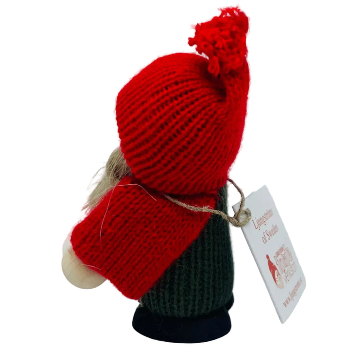 Swedish tomte girl with snowball