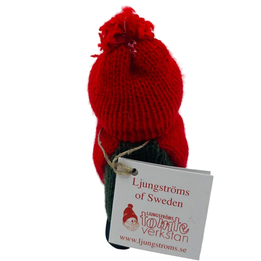 Swedish tomte girl with snowball