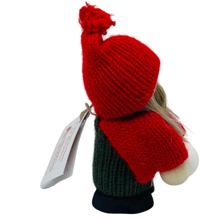 Swedish tomte girl with snowball
