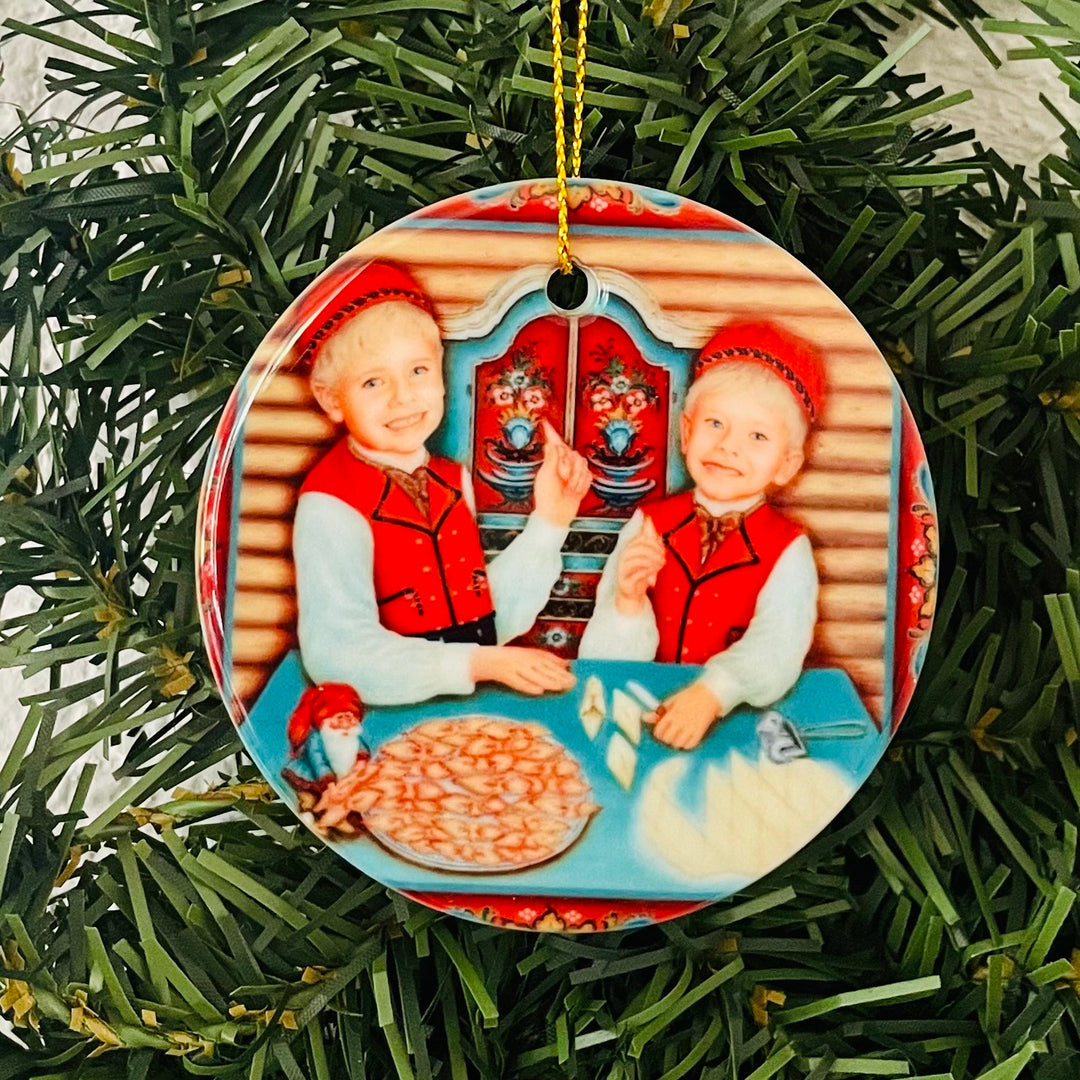 Ceramic Ornament, Suzanne Toftey Boys eating Fattigman
