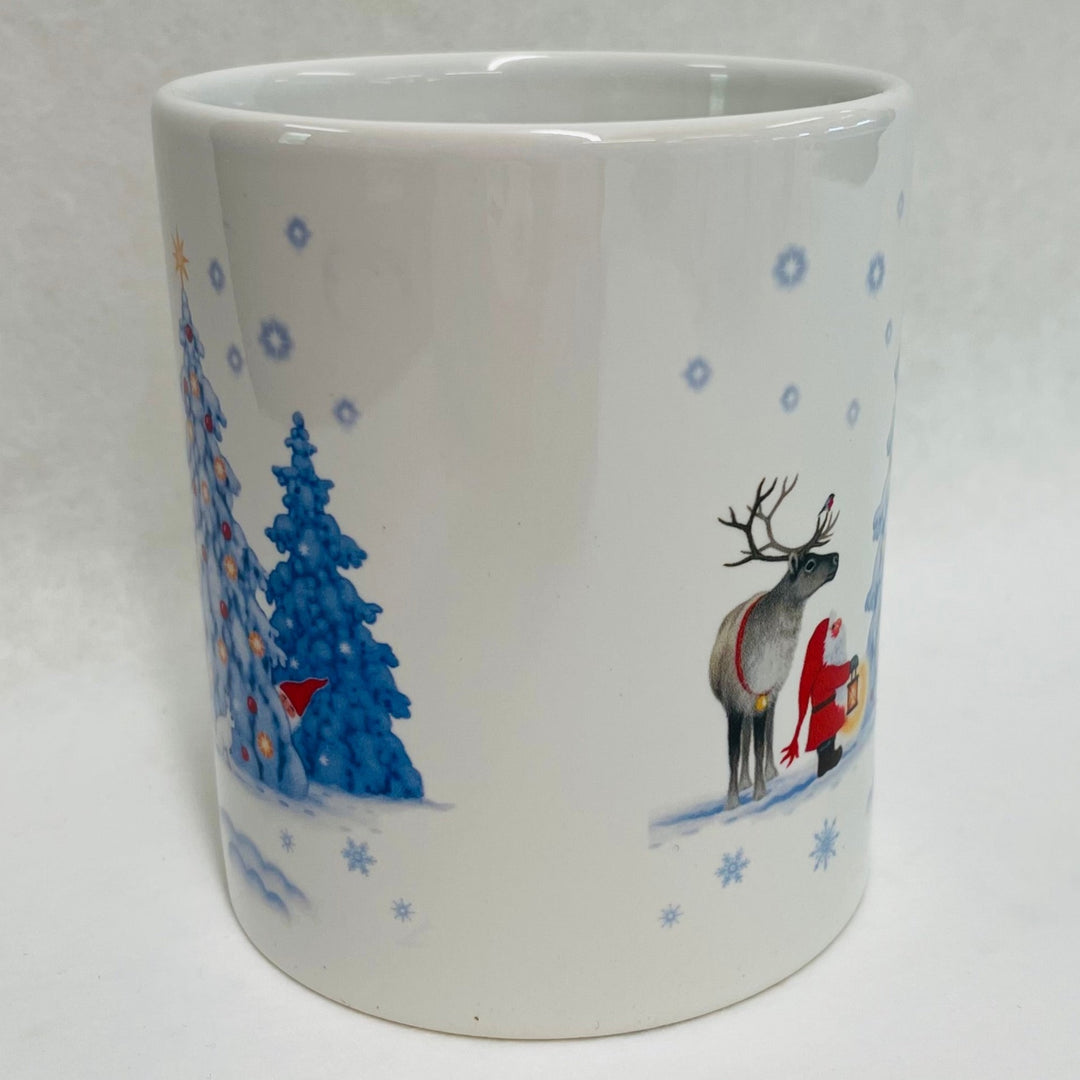 Eva Melhuish Tomte & Reindeer at Snowy trees coffee mug