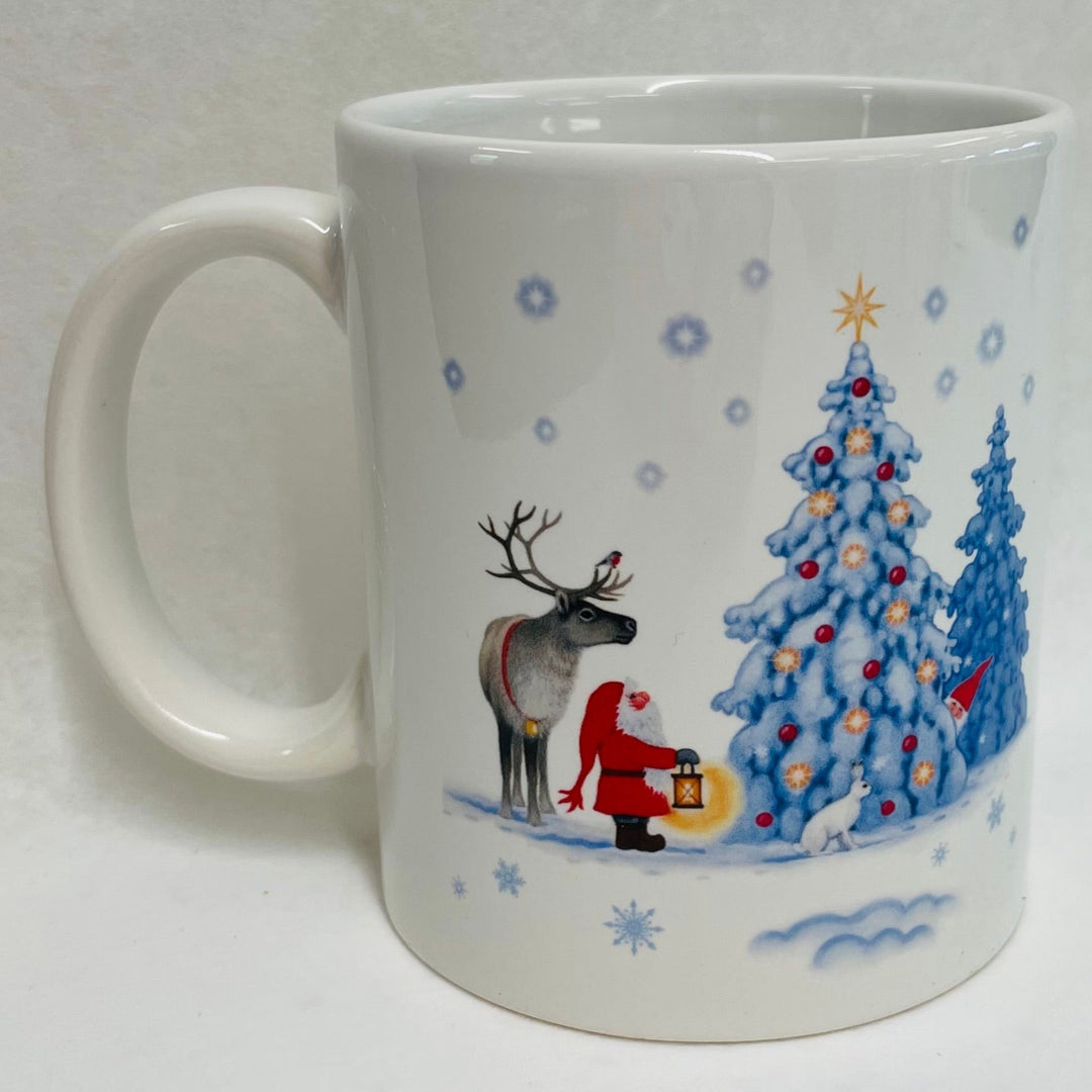 Eva Melhuish Tomte & Reindeer at Snowy trees coffee mug