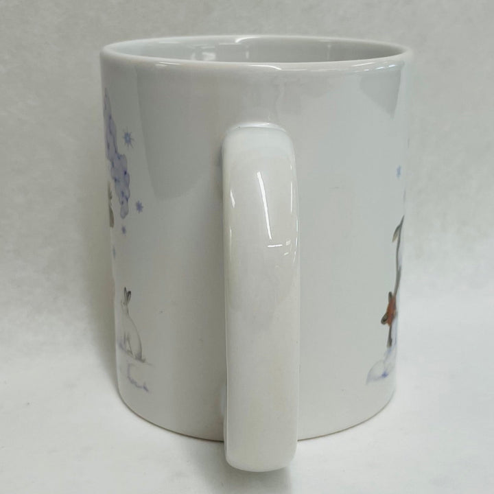 Eva Melhuish Reindeer in the snow coffee mug