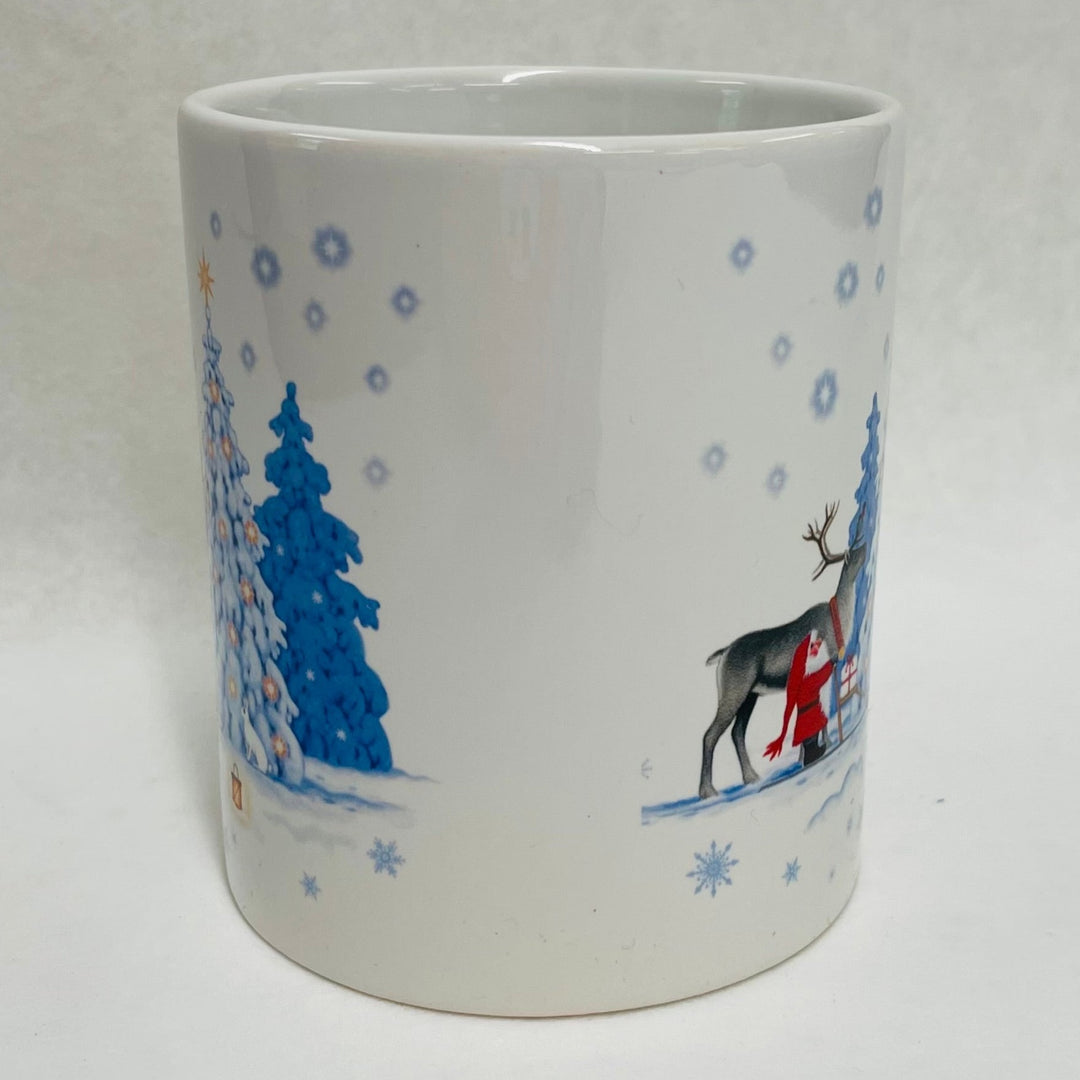 Eva Melhuish Tomte & Reindeer at Snowy trees coffee mug