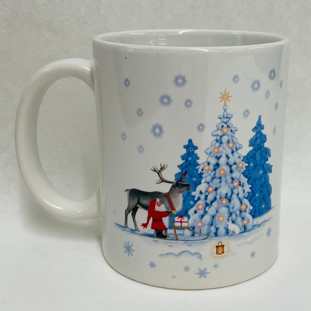 Eva Melhuish Tomte & Reindeer at Snowy trees coffee mug