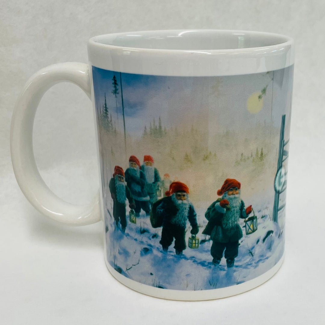 Jan Bergerlind Tomtar trudging through snow coffee mug