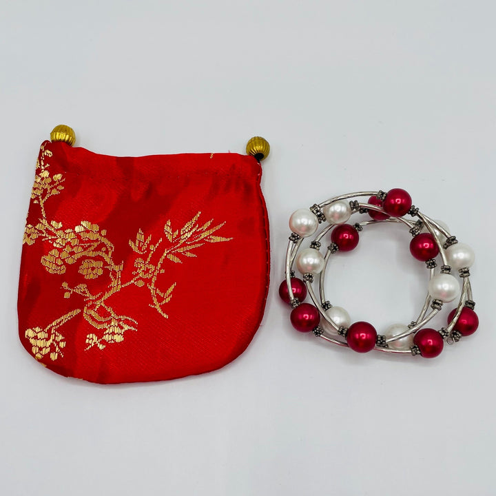 Red & White  Bead Coil Bracelet with Satin Pouch