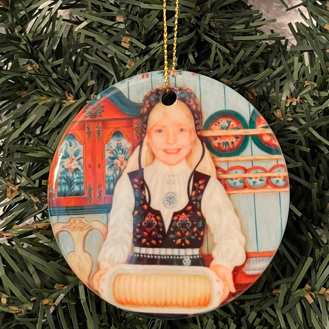 Ceramic Ornament, Suzanne Toftey  Girl with almond cake