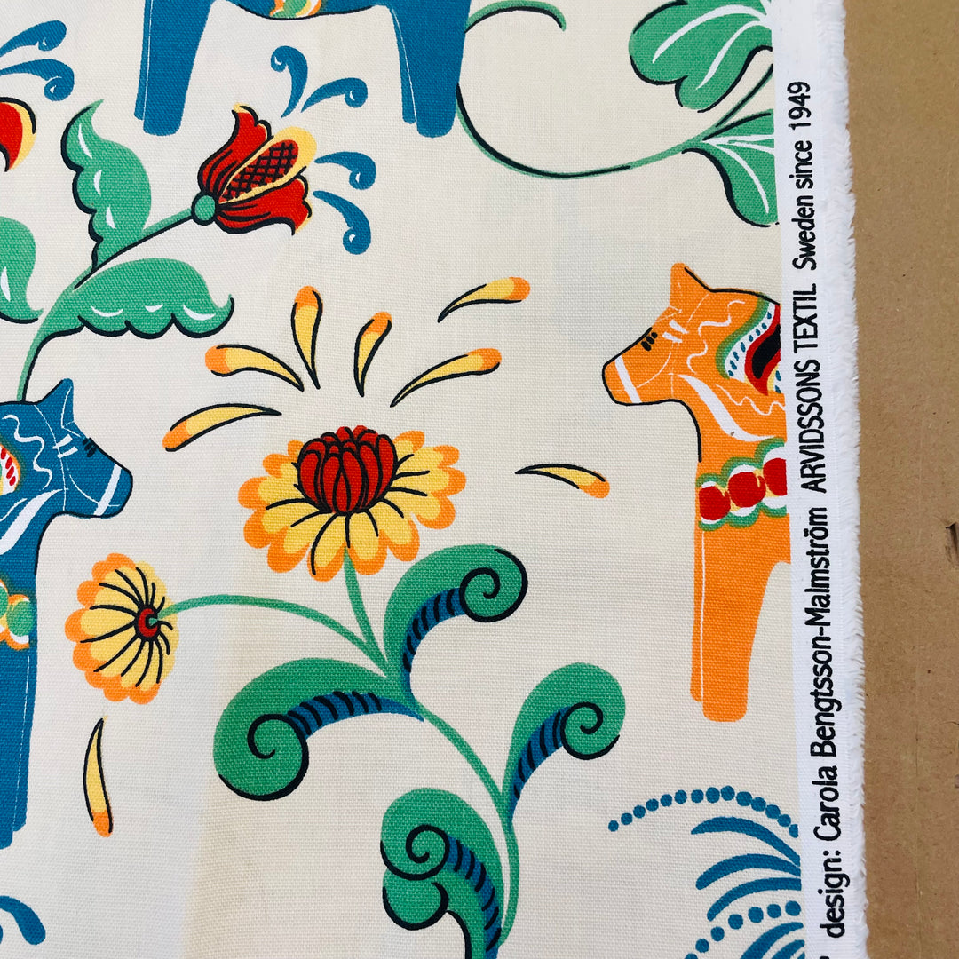 Swedish fabric - Ecru w/ multi color Dala horses & kurbits