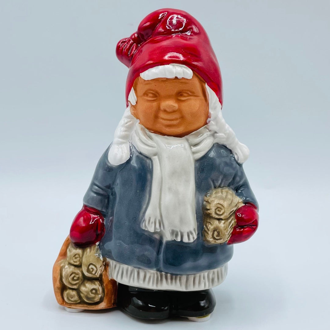 Ceramic Tomte girl carrying wood from Jie