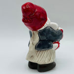 Ceramic Tomte girl carrying presents from Jie
