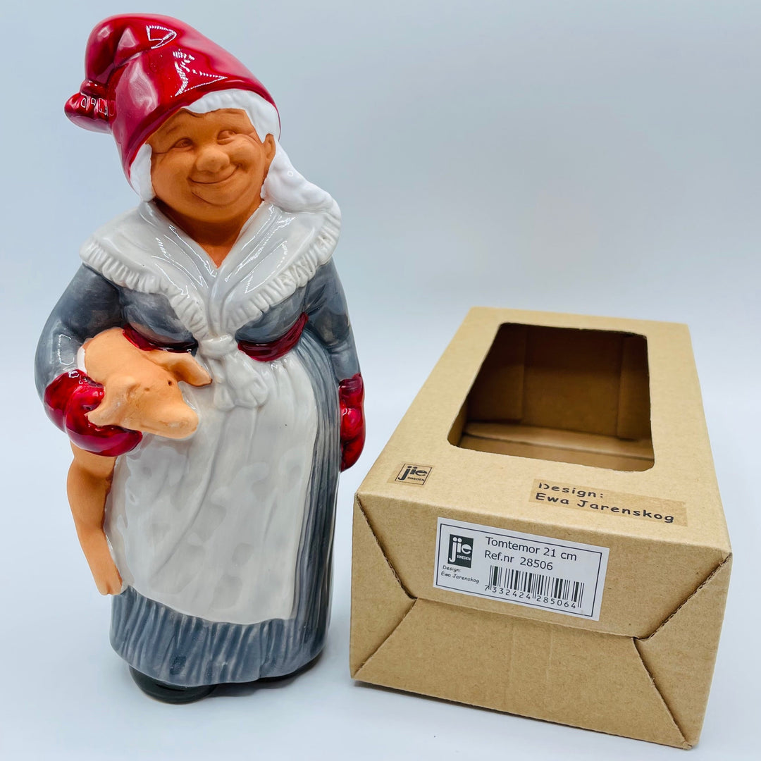 Ceramic Tomte lady carrying pig from Jie