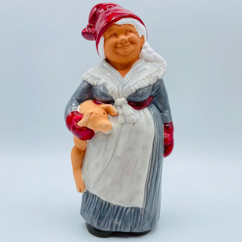 Ceramic Tomte lady carrying pig from Jie