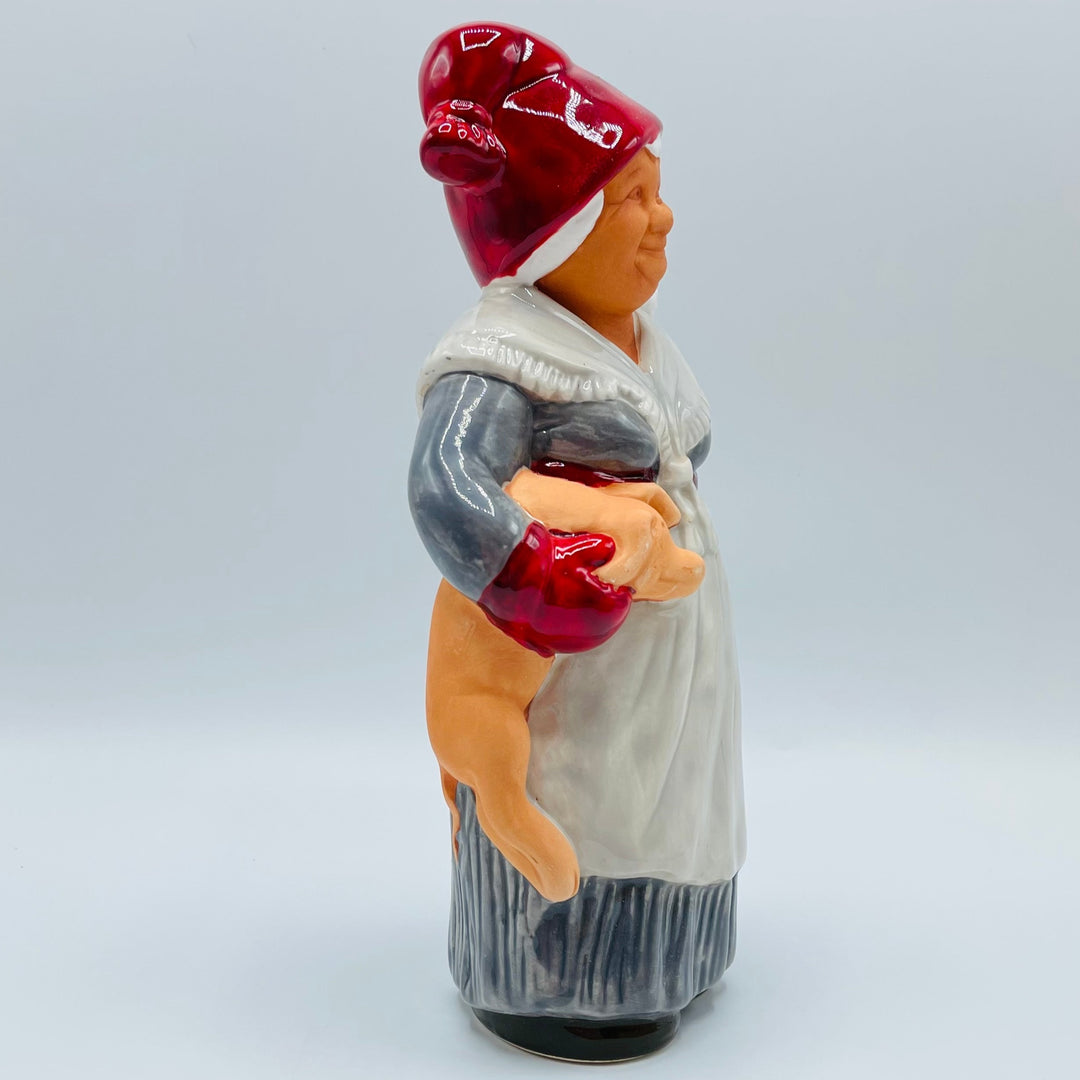 Ceramic Tomte lady carrying pig from Jie