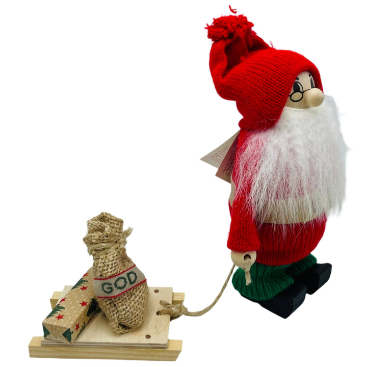 Swedish tomte with sled carrying present & jul sack