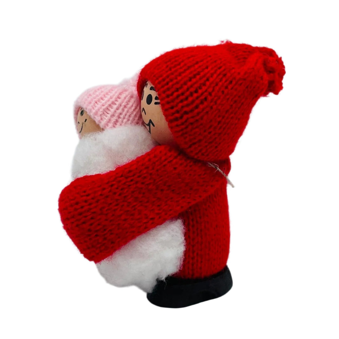 Swedish tomte holding baby