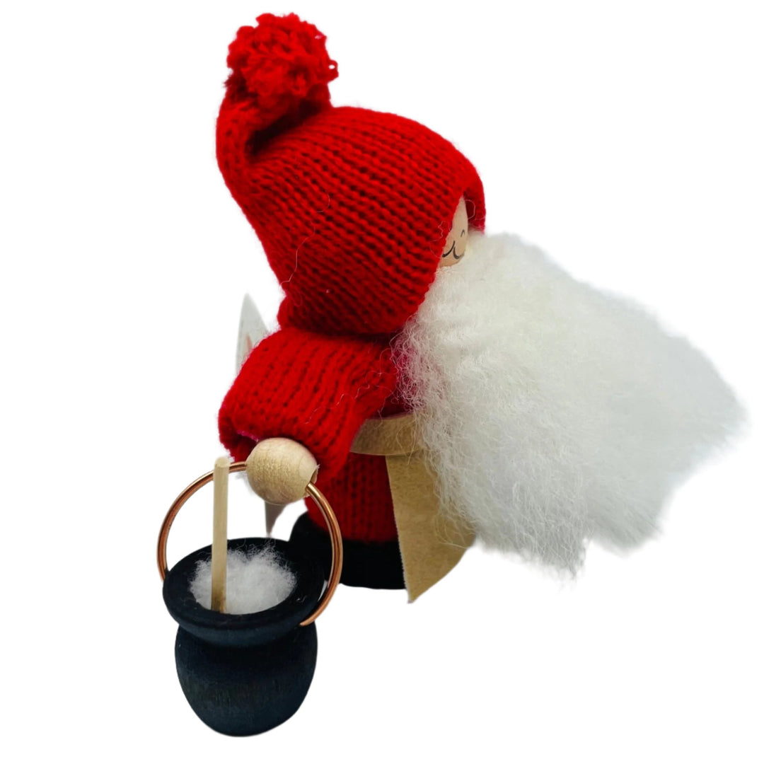 Swedish tomte with bucket of porridge