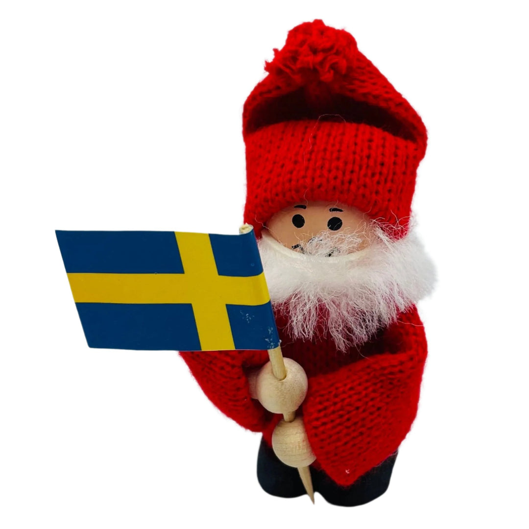 Swedish tomte holding Sweden flag