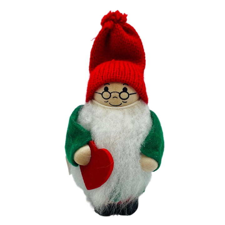 Swedish tomte holding red heart