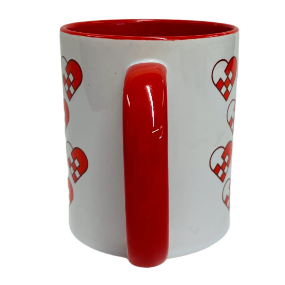 Heart Baskets coffee mug with red handle