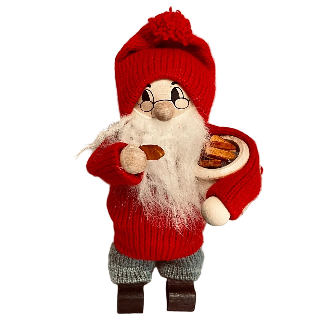 Swedish tomte with bowl of cookies