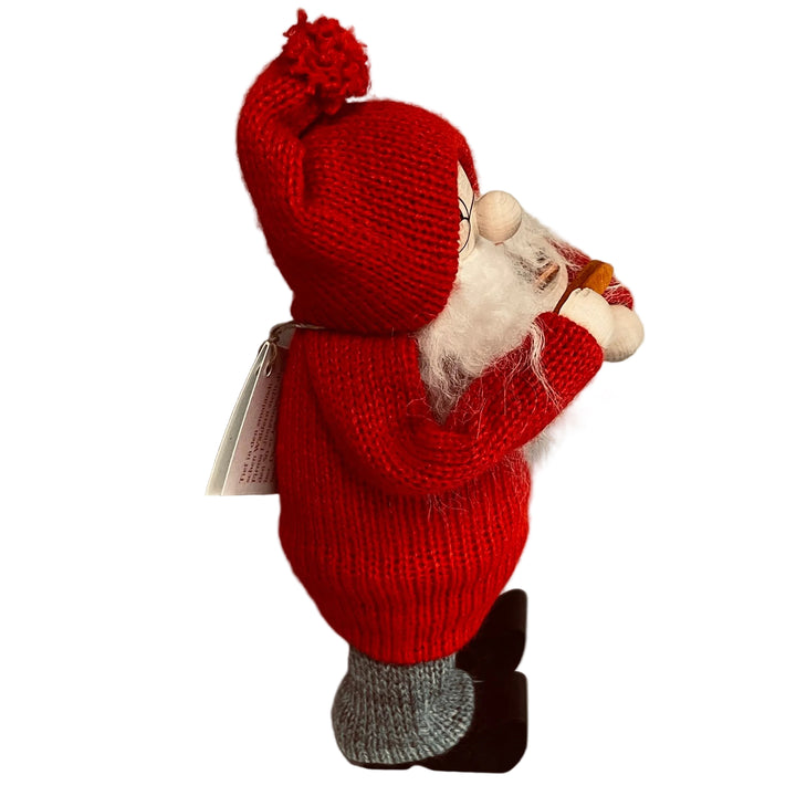 Swedish tomte with bowl of cookies